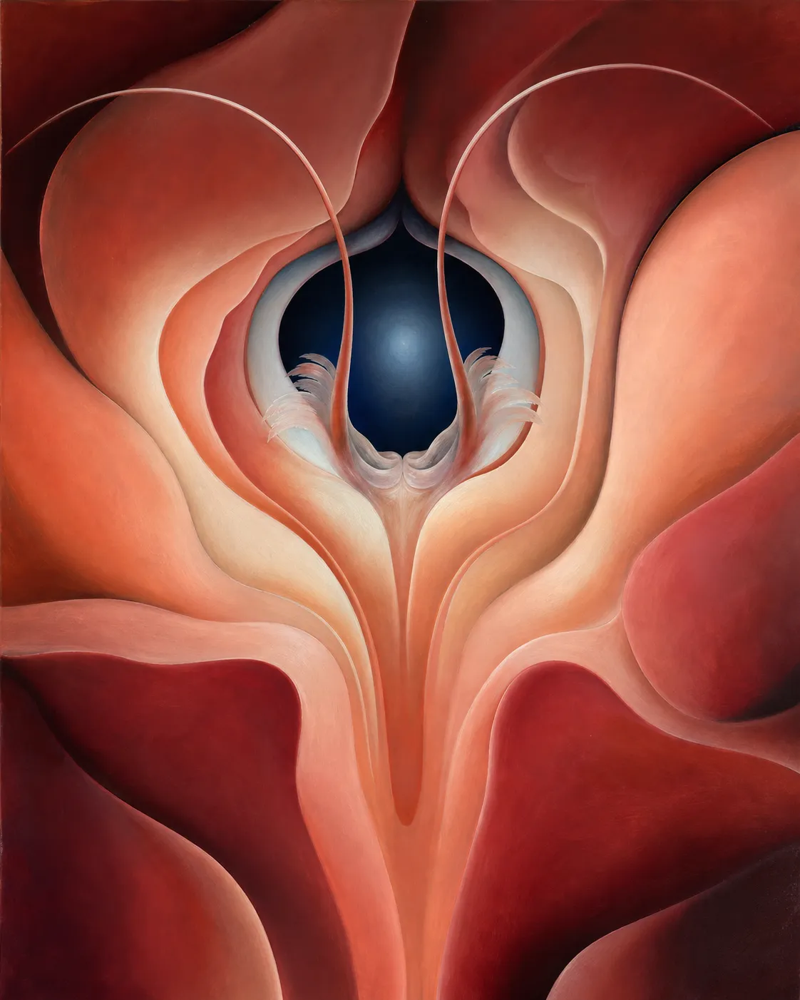 A close-cropped red and coral tideflower with broad curving petals, two pale antenna-like stamens, and a pearl-blue central aperture.